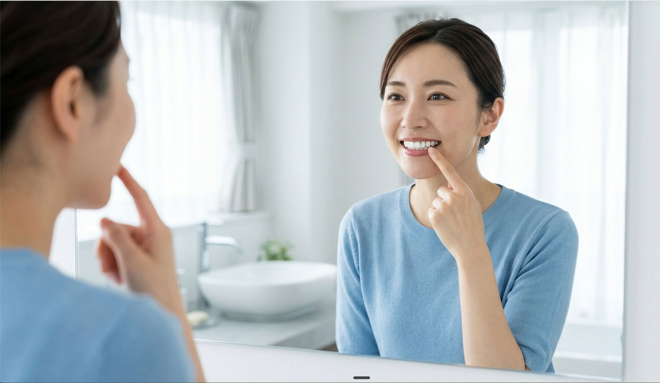 コーヒーやワインによる歯の着色を気にする日本人女性の様子